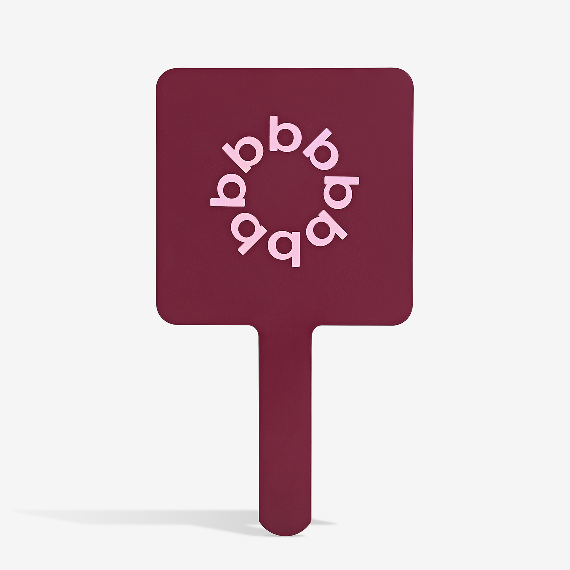 THE BURGUNDY FACE MIRROR