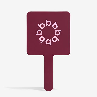 THE BURGUNDY FACE MIRROR